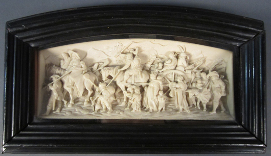 Circa-1820 Continental depiction of a procession carved onto a curved ivory tusk, 9¼ inches wide by 3½ inches high. Sterling Associates image.