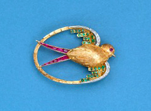 This 18-karat gold Flying Swallow brooch, circa 1925, by the Parisian firm of La Cloche Frères, featuring Burma rubies, emeralds and diamonds, will be on the stand of London dealers The Gilded Lily at the LAPADA Fair. Image courtesy The Gilded Lily and LAPADA.