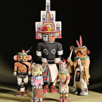 The largest kachina in this group is lot no. 153, a Hopi carved wood hemis kachina by White Bear Fredericks, 19 1/2 inches. Estimate: $500-$700. Skinner Inc. image.