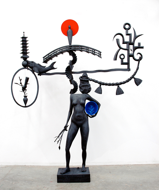  'Once in a Blue Moon,' John Buck, 2011. Wood, acrylic paint and motor; 119 x 94 x 40 inches. Photo courtesy of the artist.