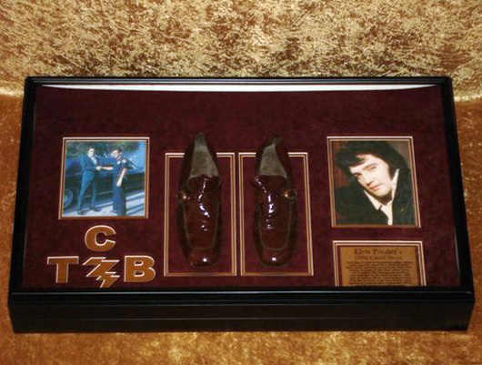 Pair of Italian-made casual burgundy shoes owned and worn by Elvis in the 1970s. These shoes were on display in Elvis-A-Rama Museum in Las Vegas for many years. Estimate: $2,500-3,000 pounds. Omega Auctions image.