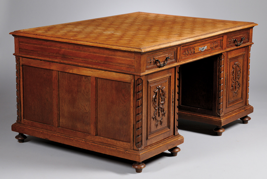 Late Victorian European-style parquetry and carved oak partners’ desk. Estimate: $700-$900. Skinner Inc. image.