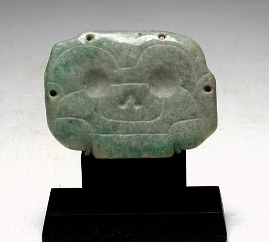 Mayan apple green jade skull face pendant, Mexico, Mayan Territories, circa 500-800 A.D. Estimate: $5,000-$6,000. Antiquities Saleroom.com image.
