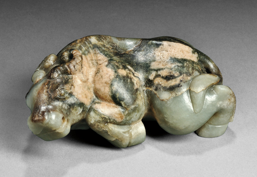 Jade carving, China, 18th century, depicting a recumbent ox, celadon color with pale pink, gray, and deep green inclusions, 5 5/8 inches long. Estimate: $80,000-$100,000. Skinner Inc. image.