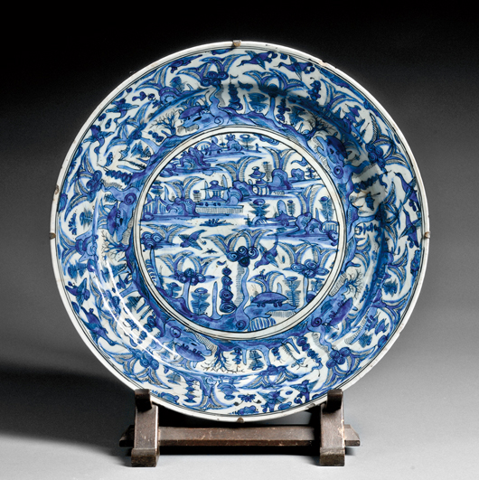 Rare blue and white charger, Iran, Safavid dynasty, 17th century, painted in a vibrant cobalt blue with dark outlines, 21 3/8 inches in diameter. Estimate: $10,000-$15,000. Skinner Inc. image.