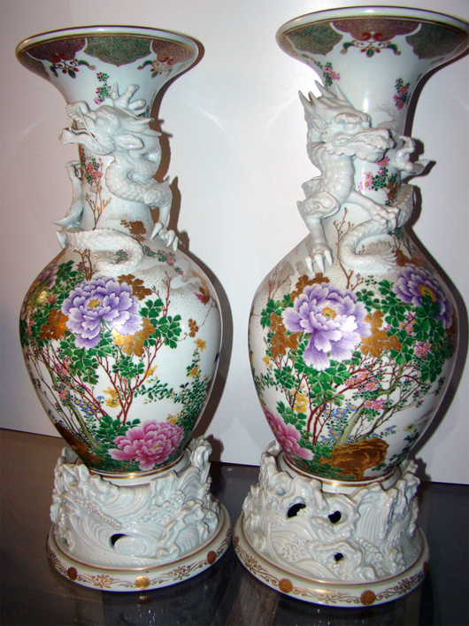 Pair of 36-inch Chinese vases wrapped with three-dimensional dragons. TAC Auctions image.