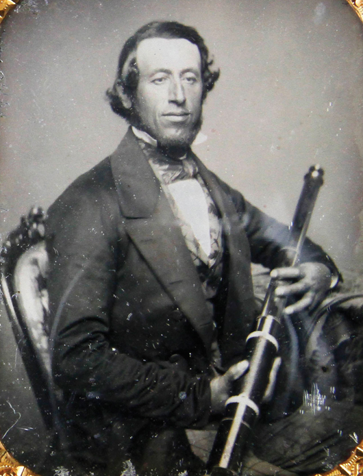 Daguerreotype, one-sixth plate, man holding a telescope, split leather case, 3 3/4 inches high x 3 1/4 inches wide. Estimate: $3,000-$5,000. Kaminski Auctions image.