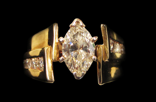14K yellow gold ring with 1-carat marquise diamond, I color, SI1, accented by 10 small channel-set diamonds. Est. $3,000-$4,000. WatchAuctionHQ image.
