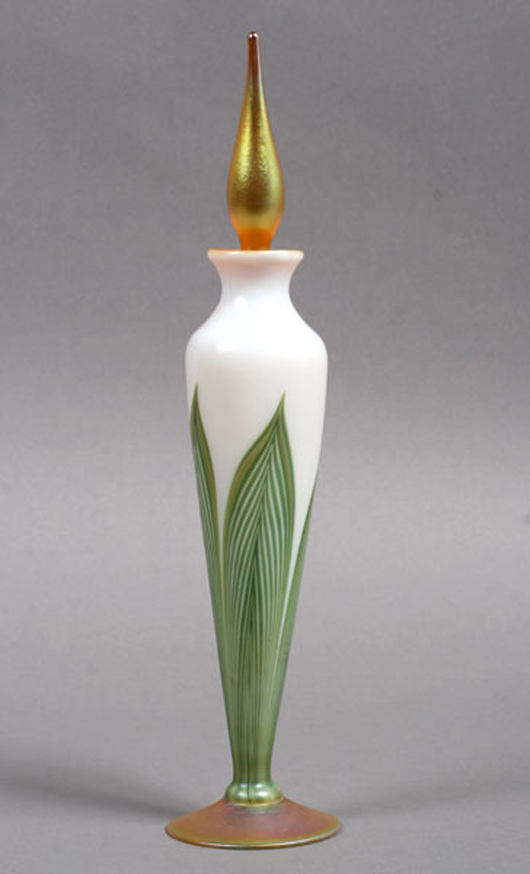Art glass scent bottle with classic feather design, signed 'L.C. Tiffany Favrile,' 10 1/2 inches. Image courtesy Kamelot Auctions. 