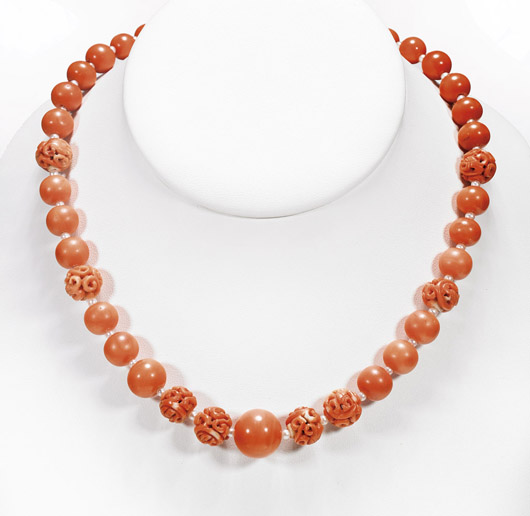 Antique Chinese coral necklace, graduated beads interspersed with tiny pearls and eight matching openwork coral beads, approx. 18 inches long. Est. $800-$1,200. I.M. Chait image.