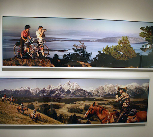 Top: ‘Mountain Bikers’ by Bob and Ira Spring. Bottom: ‘Cowboys in Grand Tetons’ by Herbert Archer and J. Hood. Photo by Kelsey Savage.