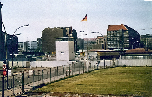 View of the Russian Zone in Berlin from the Checkpoint Charlie observation post, 1982 Image by Lyrimac at en.wikipedia. This file is licensed under the Creative Commons Attribution-Share Alike 3.0 Unported, 2.5 Generic, 2.0 Generic and 1.0 Generic license.