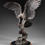 Steve Retzlaff (American, 20th/21st century), ‘Freedom,’ cast .999 silver, on marble and walnut base, total height 34 inches. Estimate: $8,000-$12,000. Skinner Inc. image.