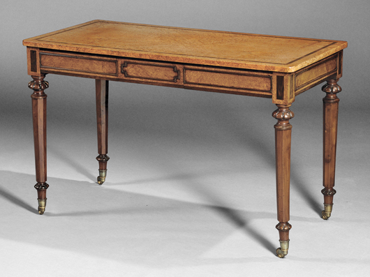 William IV writing table, England, circa 1840, finely veneered in amboyna wood with calamander banding to the top. Estimate: $8,000-$12,000. Skinner Inc. image.  