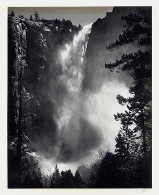 One of 18 silver gelatin prints from Ansel Adams' Yosemite portfolio, all initialed by him and printed under his supervision circa 1973. The set of 18 is estimated at $20,000-$30,000. Case Antiques Auction image.