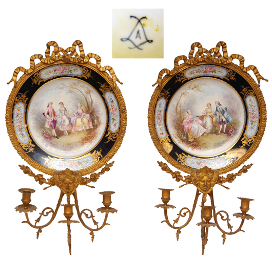 Pair of 18th century French Sevres bronze mounted chargers, 25 1/2 inches tall. Estimate: $3,000-$5,000. Elite Decorative Arts image.