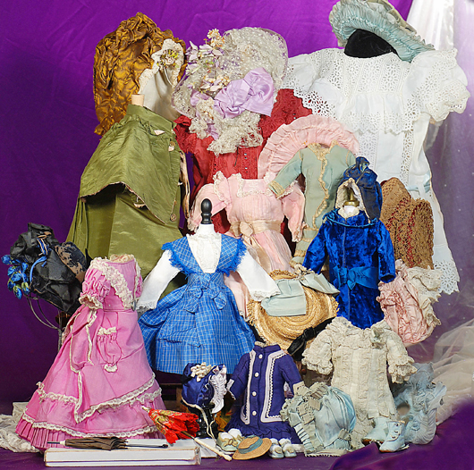 Selection of antique and vintage doll clothing. Frasher’s Doll Auctions image.