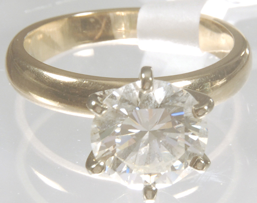 Stunning 2.25-carat round brilliant diamond ring set on a 3mm 14kt gold band, VS1-VS2 for clarity-color. Woody Auction image.