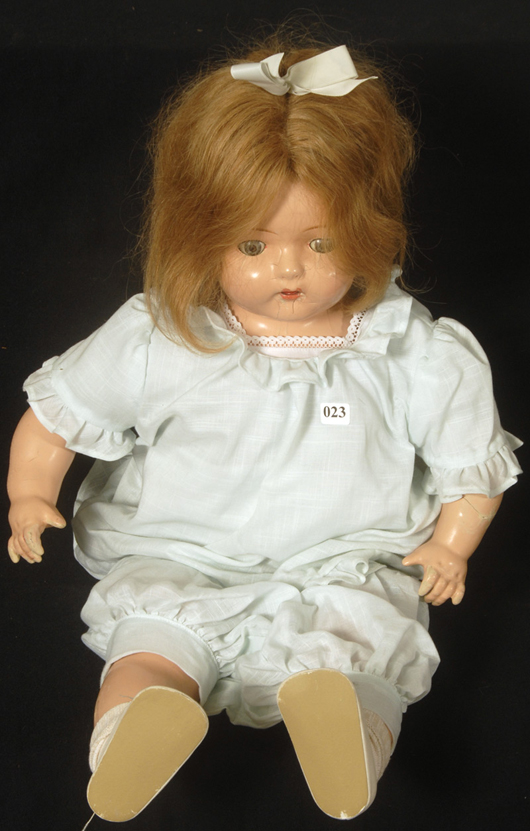 Twenty-seven-inch Dolly Record doll by Madame Hendren with composition head and phonograph built into the body, circa 1920s. Woody Auction image.