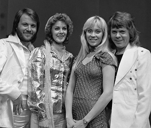 April 1974 photo of ABBA (from left: Benny Andersson, Anni-Frid Lyngstad, Agnetha Faltskog, Bjorn Ulvaeus) during their appearance on the Dutch television show AVRO's TopPop. Images from Beeld en Geluidwiki are available under the cc-by-sa license. Creative Commons Attribution-Share Alike 3.0 Unported license.