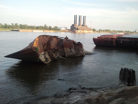 The current state of the USS Inaugural is revealed in this recent photo of the former WWII minesweeper now lying in the Mississippi River, St. Louis., Missouri. Photo by Cadastral, licensed under the Creative Commons Attribution-Share Alike 3.0 Unported license.