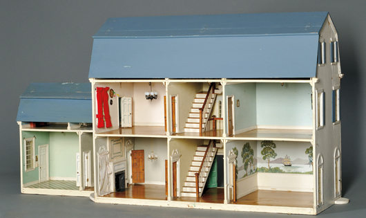 Tynietoy dollhouse mansion with ell, circa 1920s, overall dimensions 16  x 41 x 32 inches, ell 18 x 12 x 21 inches. Estimate: $8,000-$10,000. Skinner Inc. image.