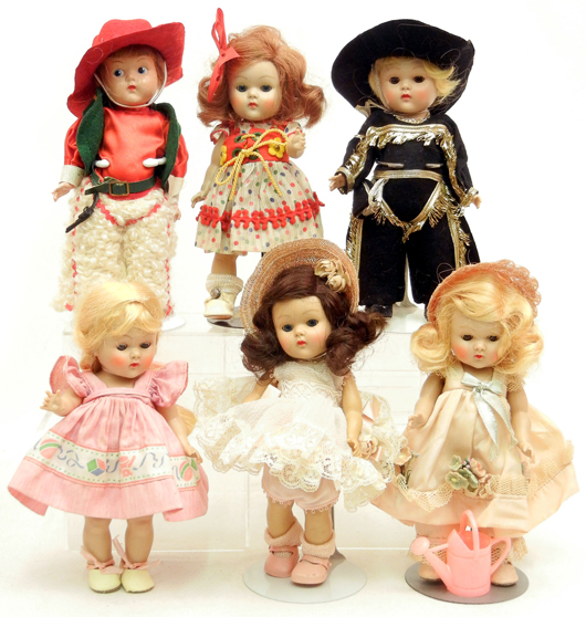 Vogue ‘strung’ plastic Ginny dolls in fancy dresses and nicely detailed costumes. Stephenson’s image.
