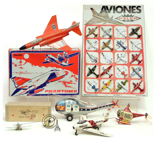 Aviation toys from the GR Webster collection, including a Sanchis Phantom II boxed jet and a Pilen S.A. store display with 20 miniature metal planes. Stephenson’s image.