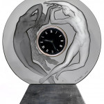 Lovely Rene Lalique gray glass La Jour et la Nuit mantel clock, signed, made circa 1926. A.B. Levy image.