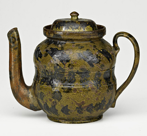 Rare teapot by George Ohr, $40,000-$60,000. Price realized: $46,875. Rago Arts & Auction Center image.