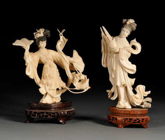 Two ivory ladies with wood stands, China, one 6 1/2 inches high. Estimate: $300-500. Skinner Inc. image.