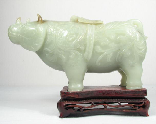 Chinese carved jade rhinoceros incense burner, est. $700-$900. Auctions Neapolitan image.