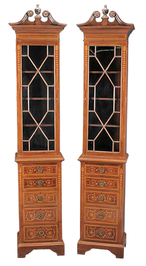 These two tall, narrow pieces of mahogany furniture are bookshelves. They would almost touch the ceiling in a traditional house today. Unusual furniture is sometimes hard to sell, but this pair sold at a Neal Auction in New Orleans for close to $3,000.
