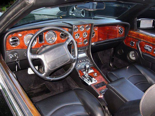 View of dashboard, 2001 Bentley Azure. Estimate: $300,000-$600,000. Government Auction image.