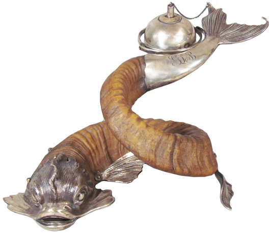 Dolphin cigar lighter with sterling silver trim and horn body, in excellent all-original condition. Price realized: $15,400. Showtime Auction Services image.
