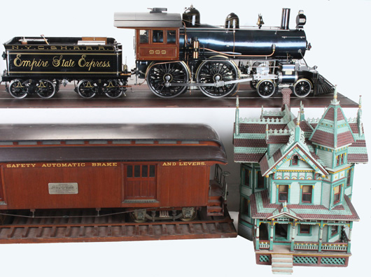 (Top) Fully functional live-steam model of the Empire State Express, 89 inches long; (bottom left) 70-inch-long salesman’s sample of an 1880s baggage car, used to advertise a braking system; and an antique architectural model of Queen Anne-style ‘Pittsburgh House,’ ex collection of Toy Museum of Atlanta. Noel Barrett Auctions image.