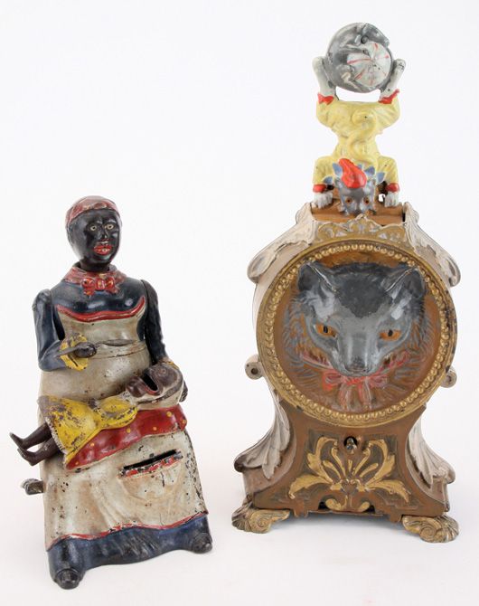 Painted cast-iron mechanical banks: Kyser & Rex ‘Mammy and Child’ and J. & E. Stevens ‘Cat and Mouse.’ Noel Barrett Auctions image.
