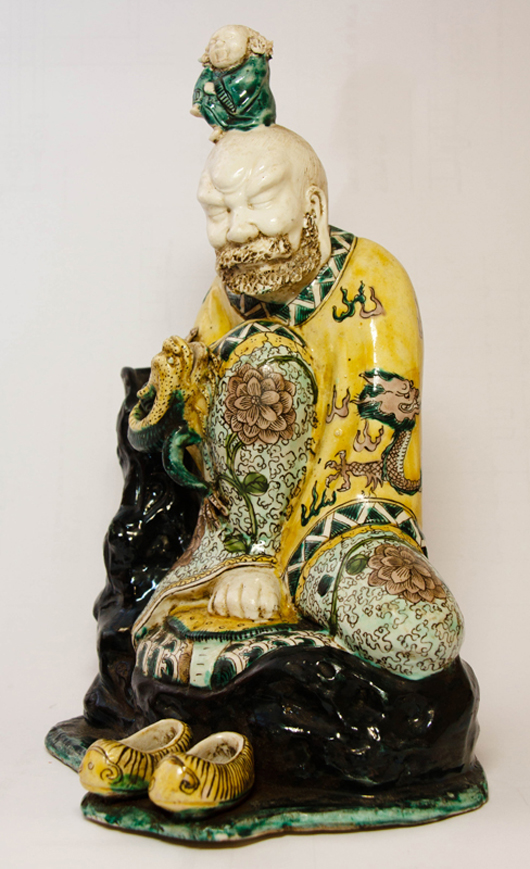 Lot 48, Chinese porcelain figure of Luohan. Zanaba Auctions image.