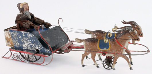 Althof Bermann hand-painted tin Santa in Sleigh, one of four known examples, a highly important American toy, est. $100,000-$200,000. Noel Barrett Auctions image.