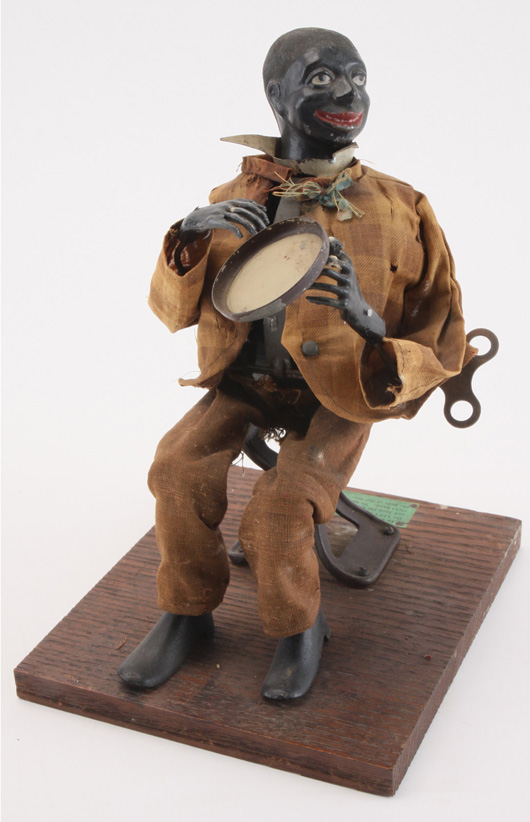Jerome B. Secor (Bridgeport, Conn.) clockwork Tambourine Player, est. $10,000-$15,000. Noel Barrett Auctions image.
