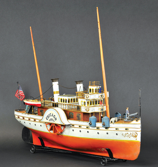 Marklin paddle wheeler “Chicago,” circa 1900-1902, 31 inches long, accompanied by original box, actual example depicted on the dust jacket of the book 