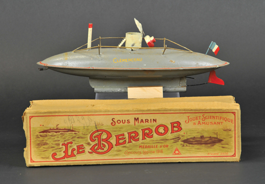Jouets Francais JIF boxed submarine, side stenciled “Clemenceau,” 12 inches long, design won gold medal at a 1916 toy fair, est. $2,500-$3,000. Bertoia Auctions image.