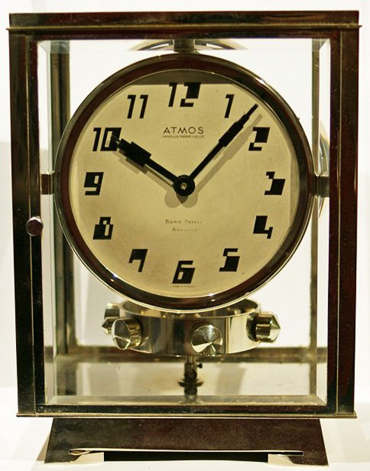 Very rare French Atmos Pendule Perpetull clock, silver dial with Art Deco Arabic markers, patent plaque inscribed 'BREVETS J.L. REUTTER, S.G.D.G., MADE IN FRANCE. Est. $8,500-$10,000. Image courtesy of Baer & Bosch Auctioneers.