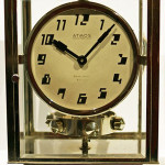 Very rare French Atmos Pendule Perpetull clock, silver dial with Art Deco Arabic markers, patent plaque inscribed 'BREVETS J.L. REUTTER, S.G.D.G., MADE IN FRANCE. Est. $8,500-$10,000. Image courtesy of Baer & Bosch Auctioneers.