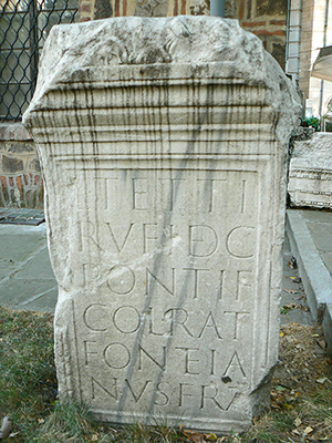 An ancient gravestone from the 4th century BC Roman colony of Ratiaria carries an inscription about Tettius Rufus, a decurion [Roman cavalry officer] and pontiff. The gravestone is held in the collection of the National Archaeological Institute and Museum in Sofia, Bulgaria. Image by Vassia Atanassova, Spiritia, licensed under the Creative Commons Attribution-Share Alike 3.0 Unported, 2.5 Generic, 2.0 Generic and 1.0 Generic licenses.