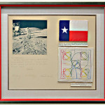 Framed Texas flag and football embroidery carried to the moon aboard U.S. space mission, Apollo 16 signed by the astronauts. Austin Auction Gallery image.