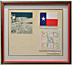 Framed Texas flag and football embroidery carried to the moon aboard U.S. space mission, Apollo 16 signed by the astronauts. Austin Auction Gallery image.