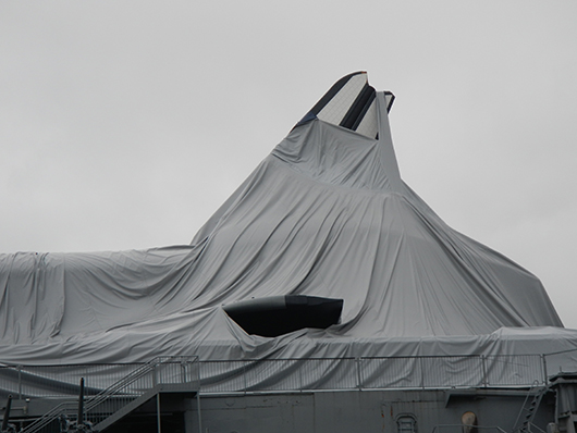 Image taken on Oct. 30, 2012, shows damage inflicted by Hurricane Sandy to the vertical stabilizer of Enterprise, which is displayed at the Intrepid Sea, Air & Space Museum in New York City. Photo by Jim Henderson, licensed under the Creative Commons Attribution-Share Alike 3.0 Unported license.
