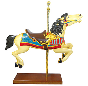 A restored wooden Allan Herschell horse jumper, circa 1930s. Image courtesy LiveAuctioneers.com Archive and Rich Penn Auctions.