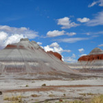 The Tepees in Petrified Forest National Park in northeastern Arizona. According to a National Park Service (NPS) document, rock strata exposed in the Tepees area of the park belong to the Blue Mesa Member of the Chinle Formation and are about 220 to 225 million years old. The colorful bands of mudstone and sandstone were laid down during the Triassic, when the area was part of a huge tropical floodplain. Oct. 4, 2010 photo by Finetooth, licensed under the Creative Commons Attribution-Share Alike 3.0 Unported license.